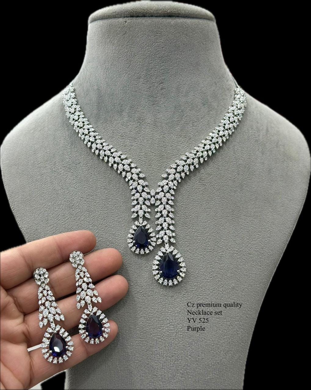 Midnight Grace: Exquisite Blue V-Shaped CZ Diamond set